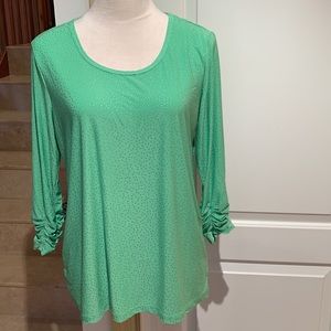 SUSAN GRAVER. Green tunic w/ silver studs. Stretch material. Long sleeve…